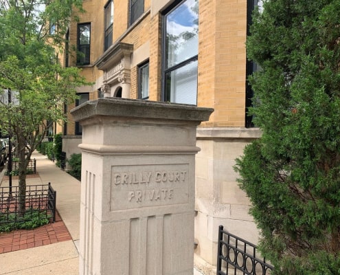 Exterior photo of Crilly Court Private sign in Chicagos Old Town Trianglecondo for sale. A bright one-bedroom unit, 1707 N Crilly Court #2W